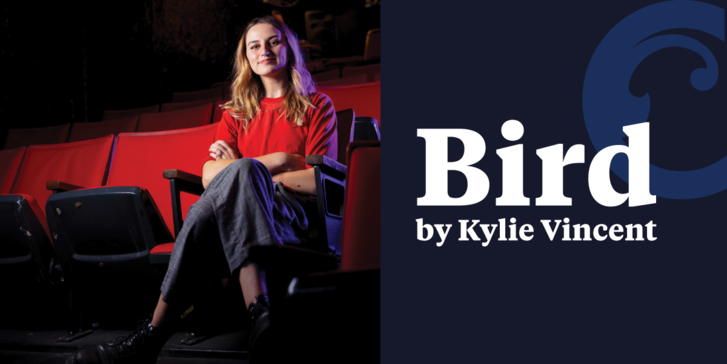 Promo for show with title and performer in print with a picture of Kylie sitting in theatre chairs