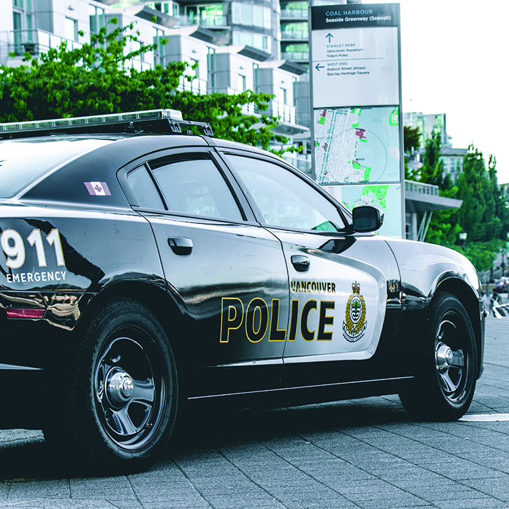 Vancouver, Canada - December 1, 2019: Close up View of police car "Vancouver Police" in Coal Harbour