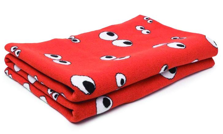 red blanket with eye pattern