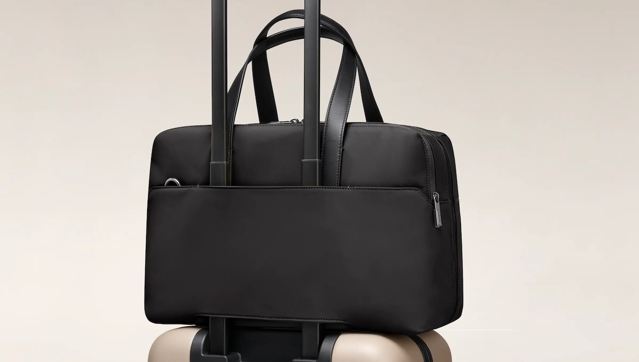 Away's weekender bag on a suitcase.