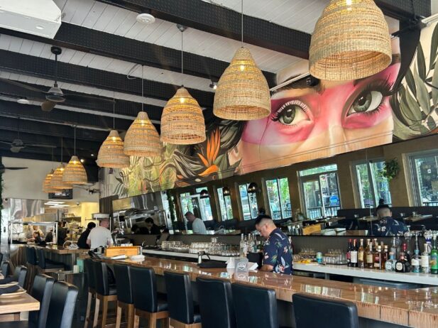 The restaurant Barra Gitano from the inside, specifically the bar area with chairs and lamps