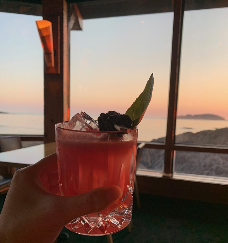 Cocktail overlooking the sunset at Pointe Restaurant.