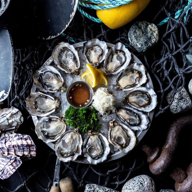 A dozen oysters on the half shell