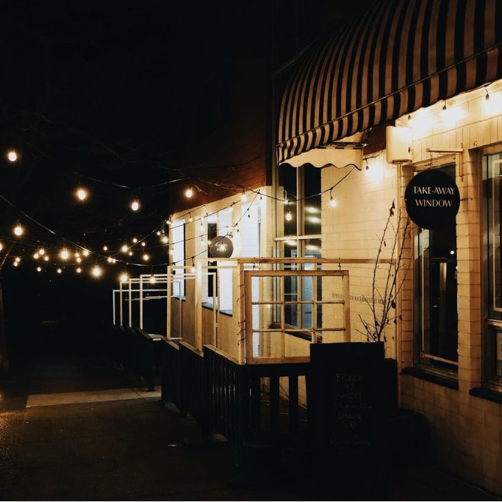 Outside of Livia restaurant and bakery at night