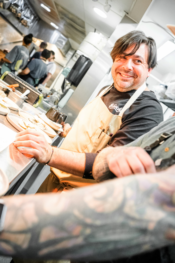 a chef smiling