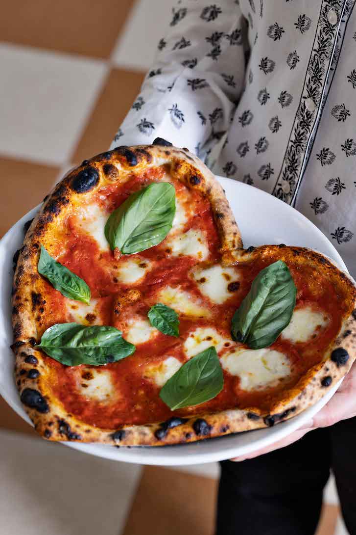 Heart shaped Margherita pizza.