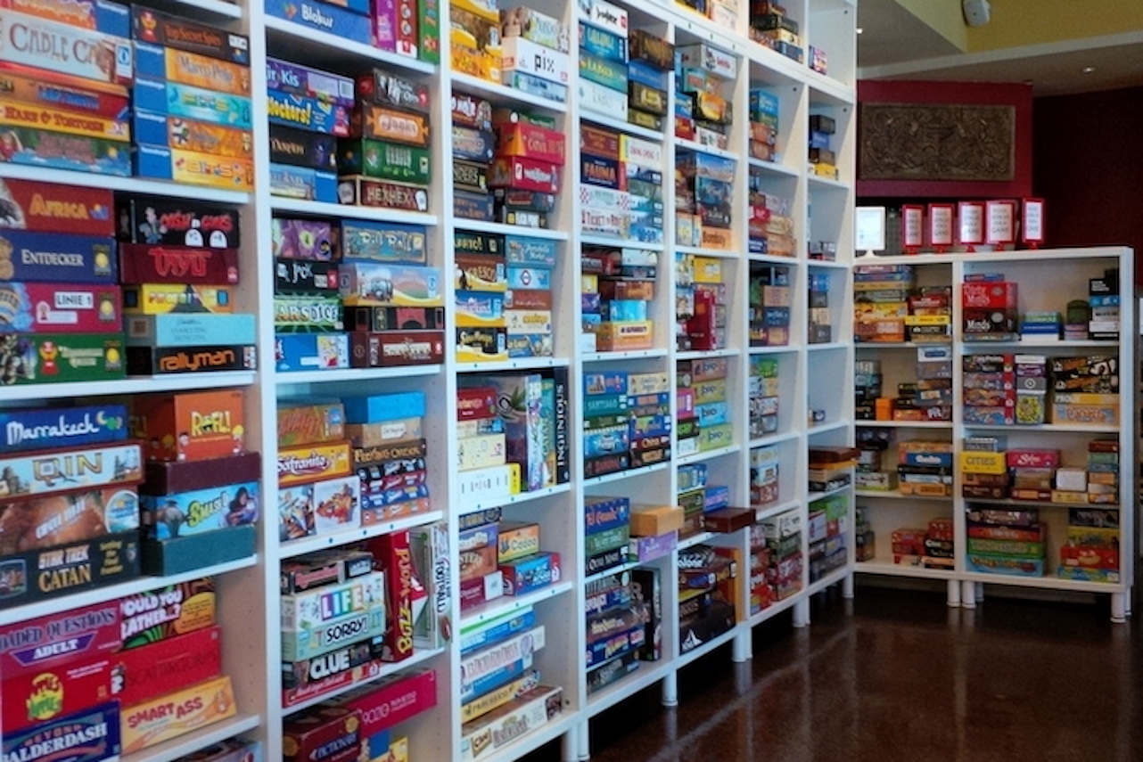 Shelves full of board games.