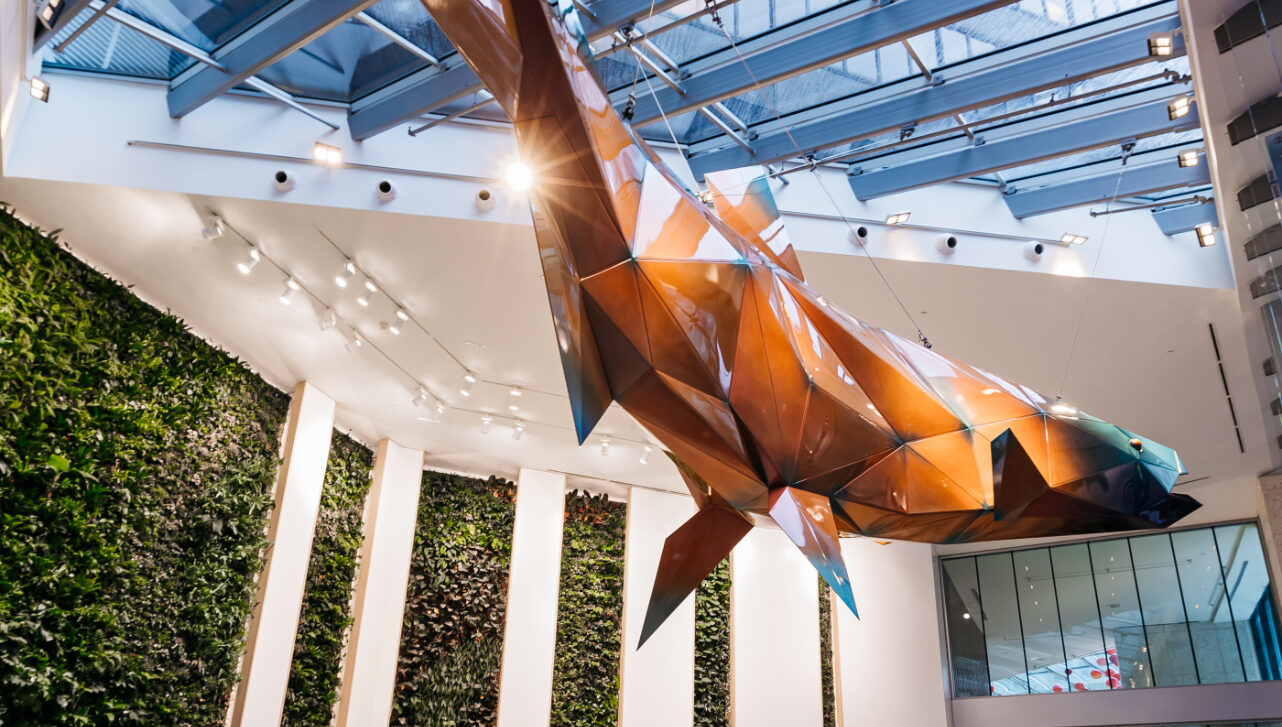 douglas coupland's spawn sculpture hangs in the vancouver centre 2 atrium