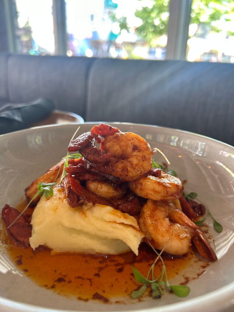 A dish made out of mashed potatoes and shrimp