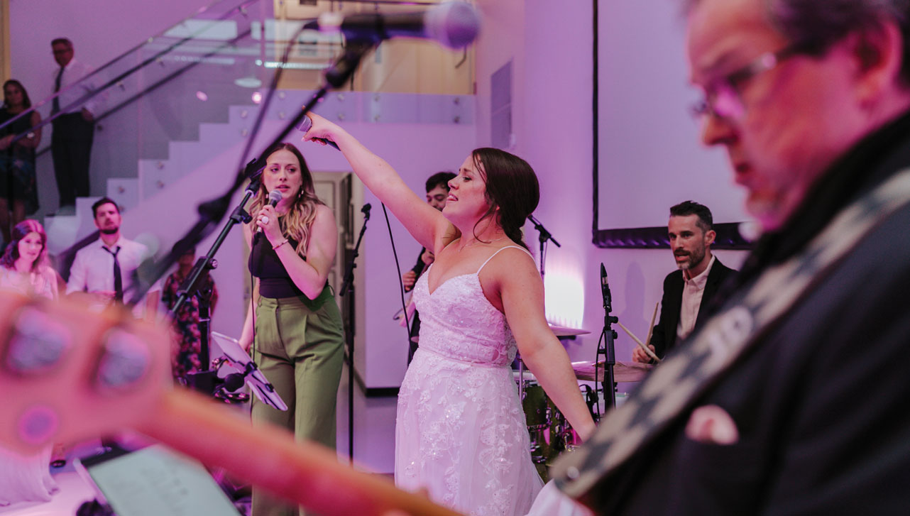 Bride singing at her wedding