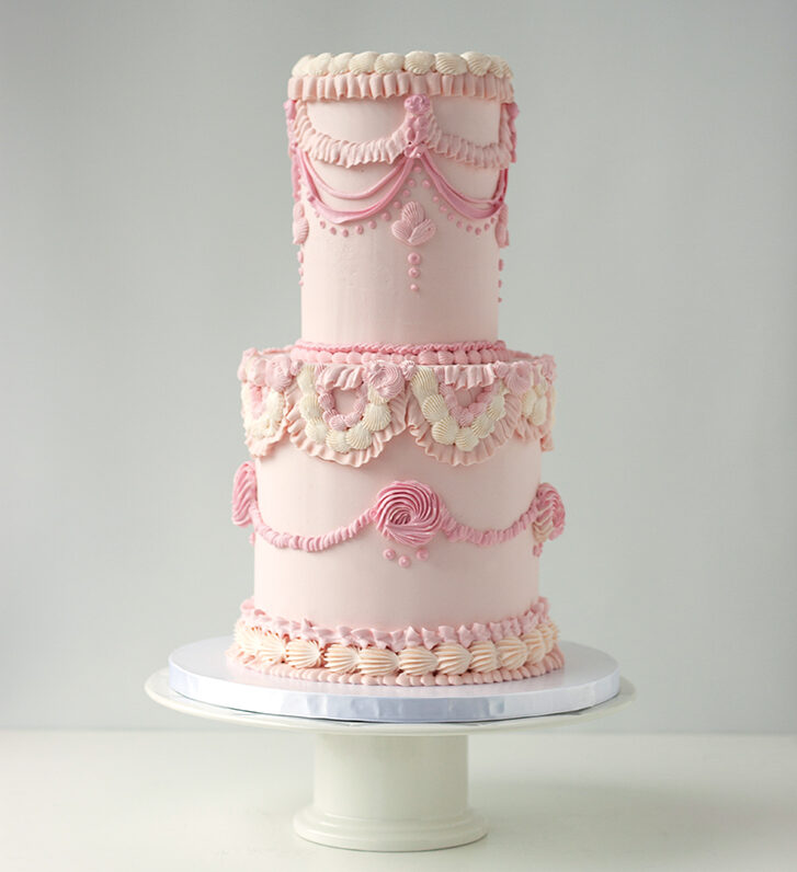 a towering buttercream Lambeth cake by Cakes in a Box