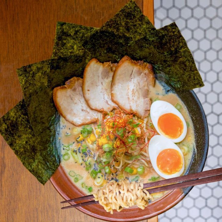 Ramen topped with chashu and two soft boiled eggs