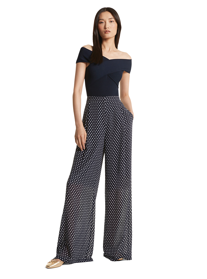 Michael by Michael Kors’s all-over polka dot Georgette trousers 