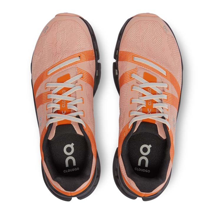 a pair of orange sneakers
